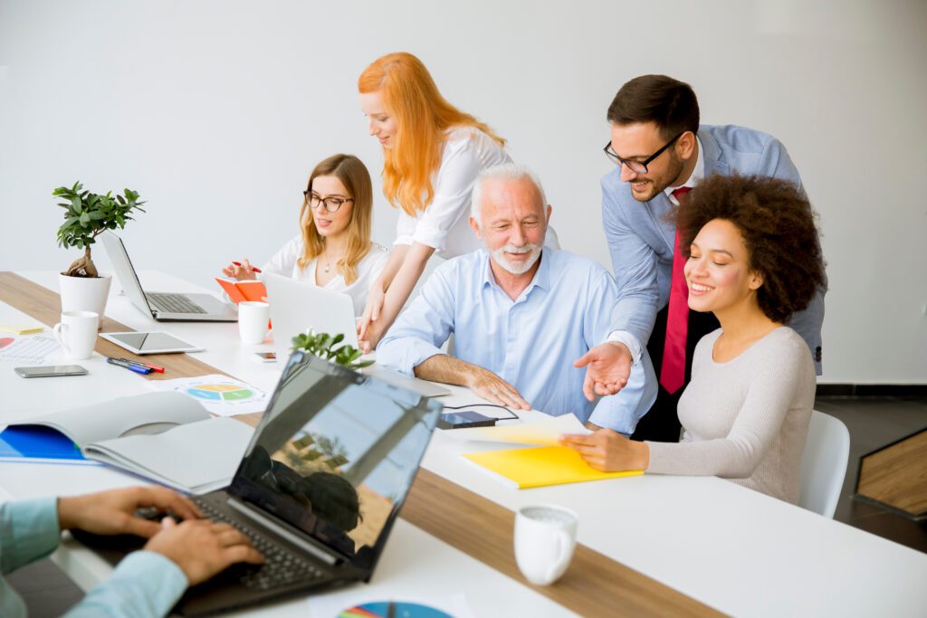 View,At,Group,Of,Young,Multiracial,Business,People,Around,Table